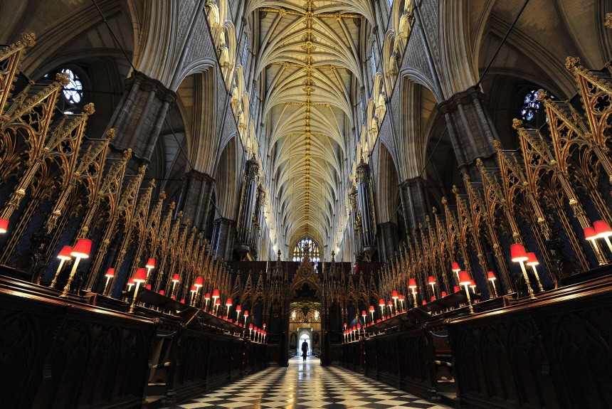 The Dean of Westminster, John Hall, walks through Westminster Abbey, in central