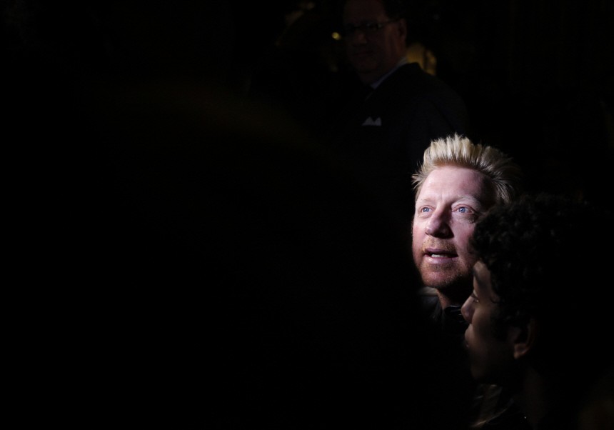 Former tennis champion Boris Becker of Germany waits for the start of the Vivienne Westwood Fall/Winter 2011 collection show at London Fashion Week