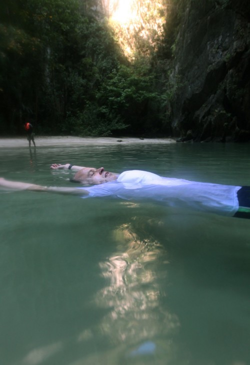 A swim through darkness to a serene cave beach at Thailand's Emer