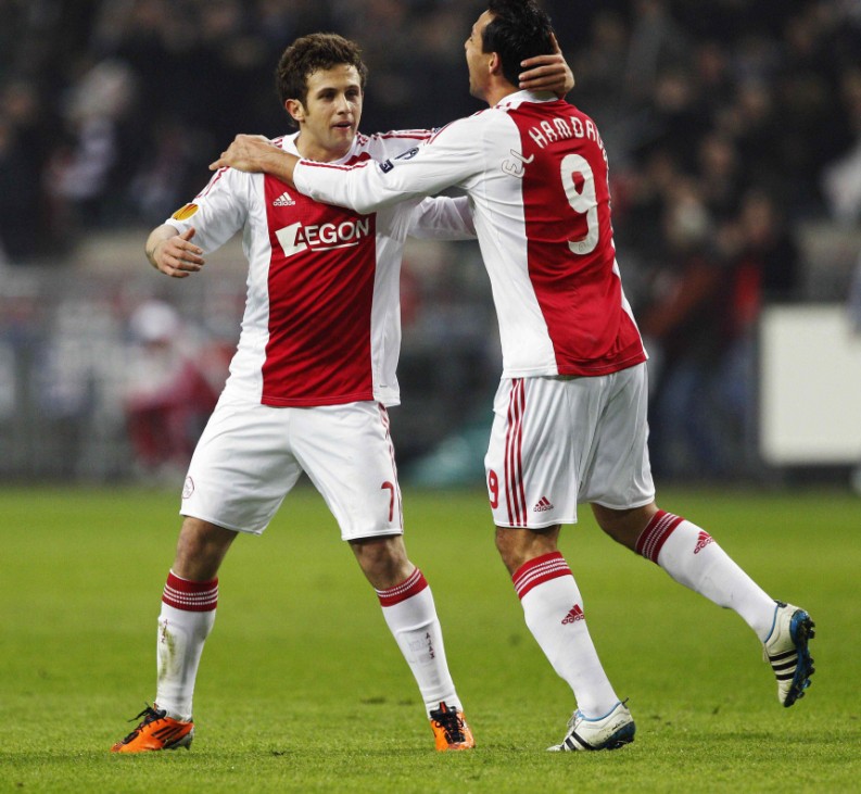 Ajax Amsterdam's Sulejmani and El Hamdaoui celebrate Ajax's first goal against Anderlecht during their Europa League soccer match at the Arena stadium in Amsterdam