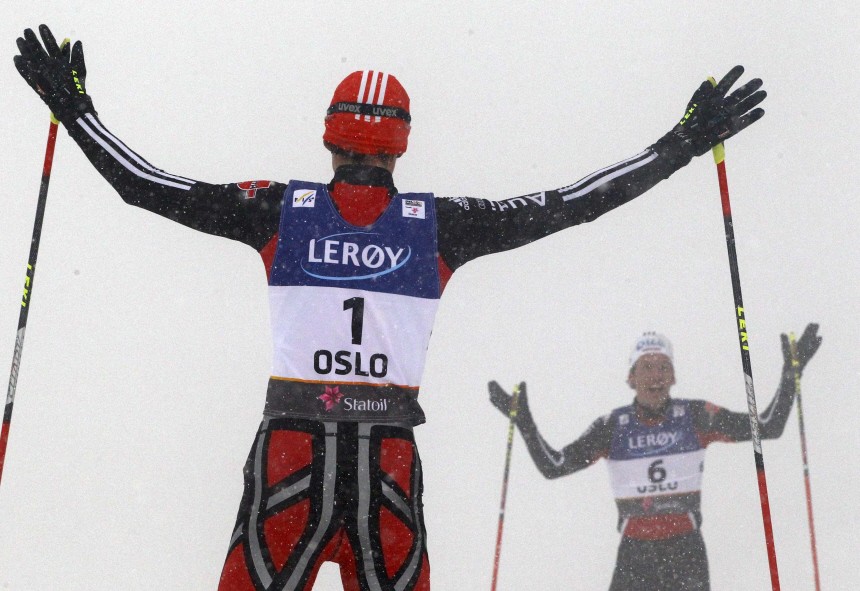 Frenzel and Edelmann of Germany celebrate  after the men's Nordic combined normal hill individual competition at the Nordic World Ski Championships in Oslo