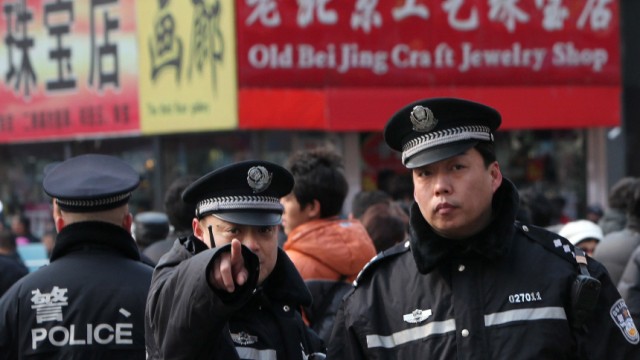 Chinese police turn up in force in Beijing's Wangfujing amid onli