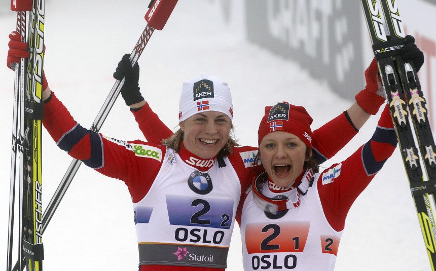 Jacobsen and Falla of Norway celebrate after winning third place in women's cross country team sprint classic event at Nordic World Ski Championships in Oslo