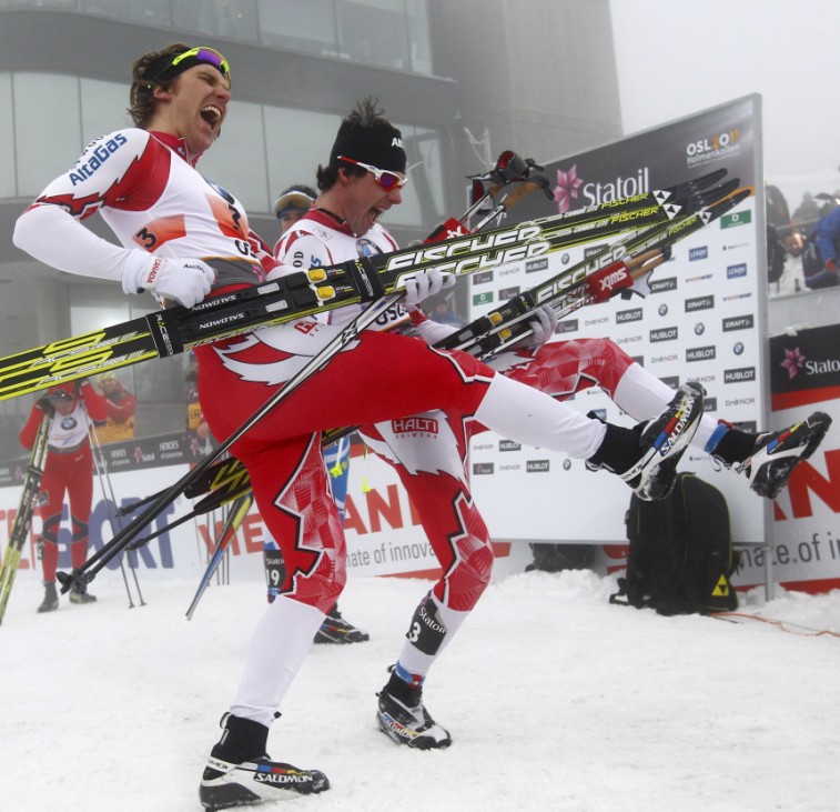 Kershaw and Harvey of Canada celebrate after they won the men's cross country team sprint classic event during the Nordic World Ski Championships in Oslo