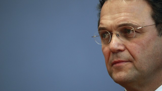 Germany's new Interior Minister Friedrich attends a news conference in Berlin
