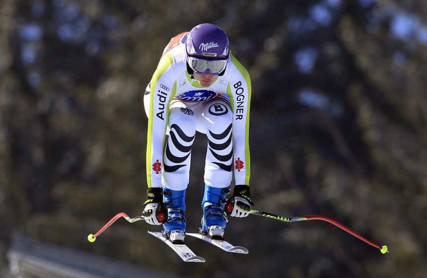 Riesch of Germany goes airborne in the downhill women's Alpine Ski World Cup race in Tarvisio