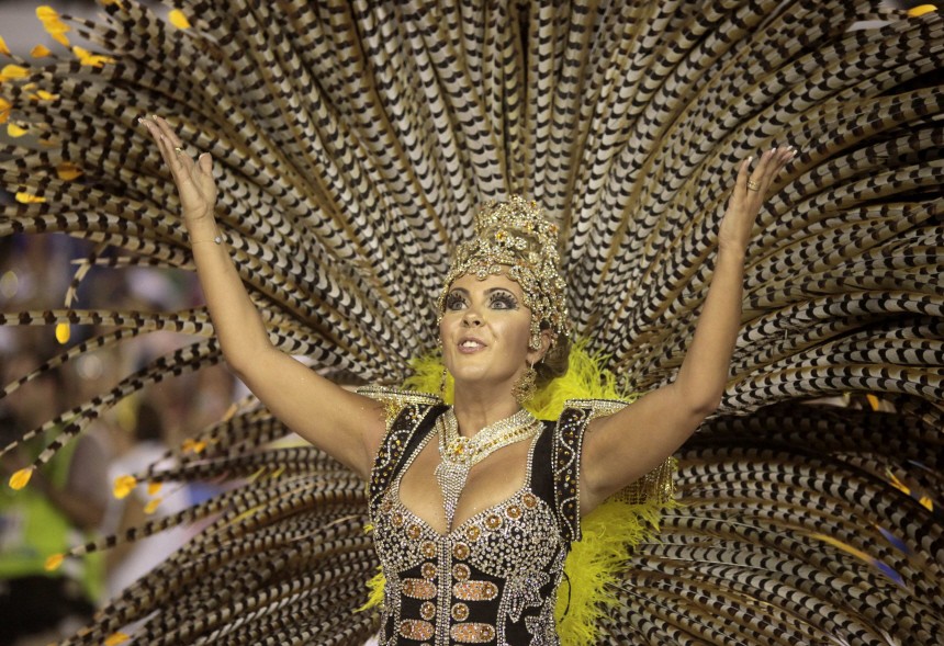 A reveller of the Unidos da Tijuca samba school participates in the annual Carnival parade in Rio