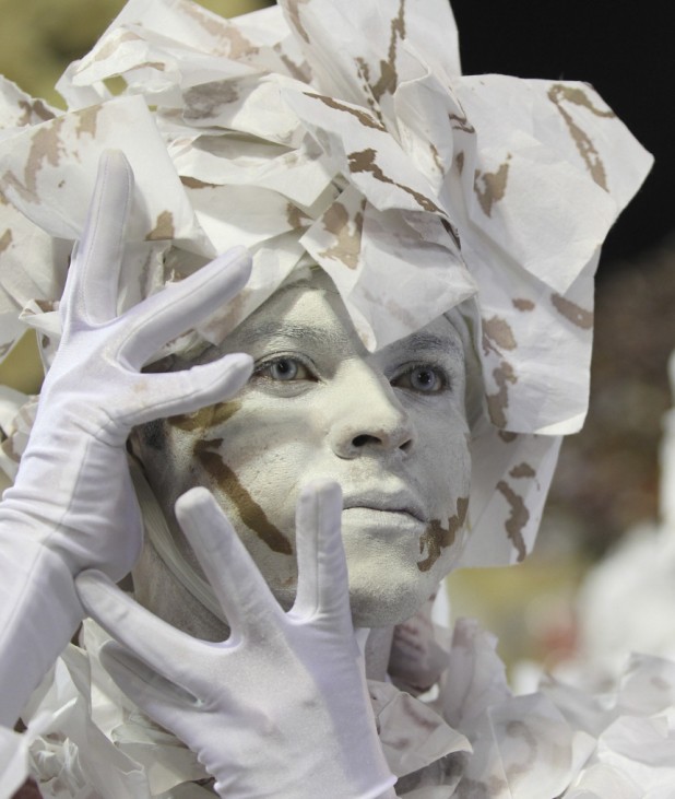 A reveler of the Uniao da Ilha samba school participates in the Carnival parade in Rio