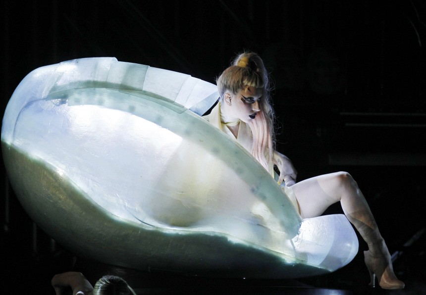 Lady Gaga steps out of a translucent egg to perform her new song 'Born This Way' at the 53rd annual Grammy Awards in Los Angeles