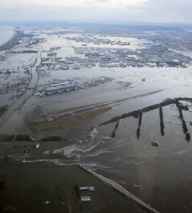 An aerial view of a tsunami swamped Sendai Airport in northeastern Japan