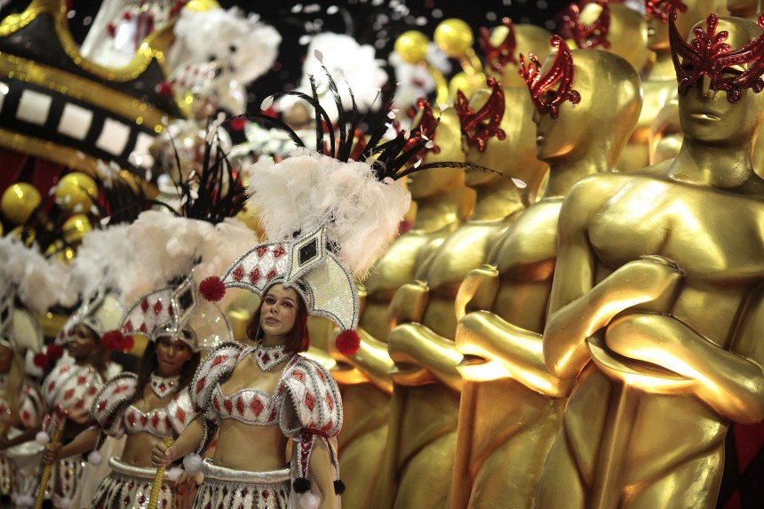 Revelers of the Salgueiro samba school participate in the Carnival parade in Rio