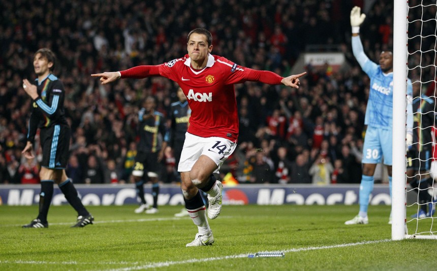 Manchester United's Javier Hernandez celebrates after scoring against Olympique Marseille during their second leg round of sixteen Champions League soccer match at Old Trafford in Manchester