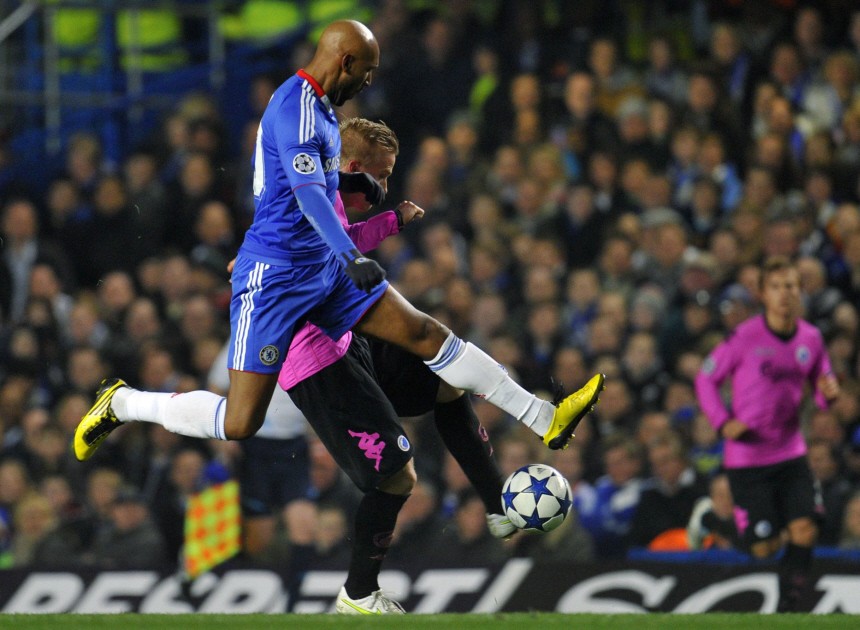 Chelsea's Anelka (L) challenges FC Copenhagen's Wendt during their Champions League round of 16 second leg soccer match in London