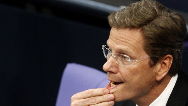 German Foreign Minister Westerwelle reacts during German Bundestag session in Berlin