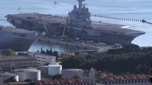 The French aircraft carrier 'Charles De Gaulle'  is seen on the quay of the naval base in Toulon