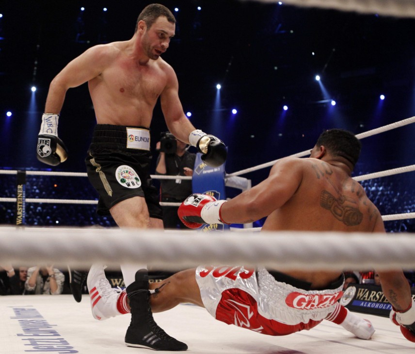 Heavyweight boxing title holder Klitschko of Ukraine knocks down Solis of Cuba during the first round of their WBC world heavyweight championship fight in Cologne