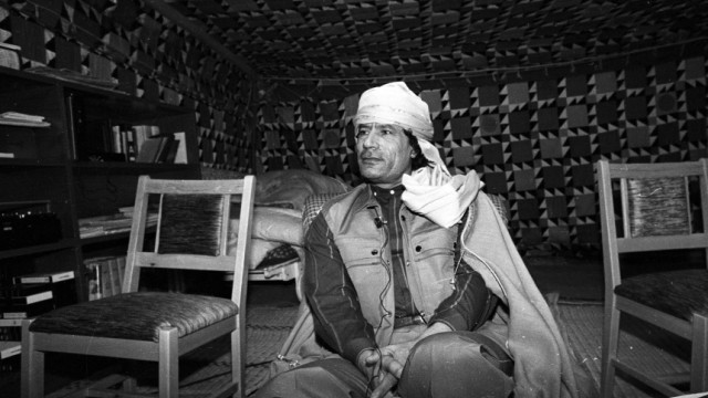 File photo of Libyan leader Muammar Gaddafi during a news conference inside his Bedouin tent erected in the heavily fortified Bab El-Assaria barracks on the outskirts of Tripoli