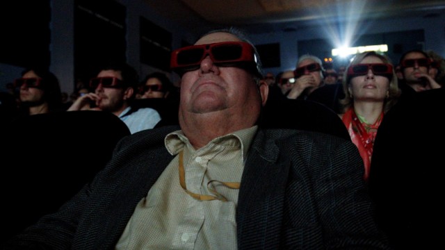People watch a 3D movie at the 67th Venice Film Festival