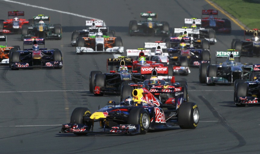 Red Bull Formula One driver Sebastian Vettel of Germany leads the pack at the start of the Australian F1 Grand Prix at the Albert Park circuit in Melbourne