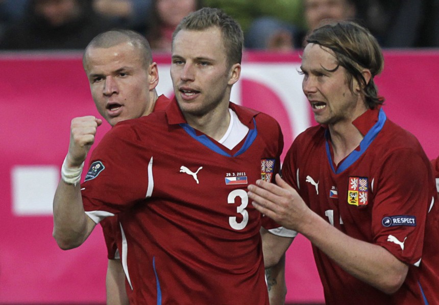 Czech Republic's Kadlec is congratulated by team mates Plasil and Hlousek after scoring against Lichtenstein during their Euro 2012 qualifying Group I soccer match in Ceske Budejovice