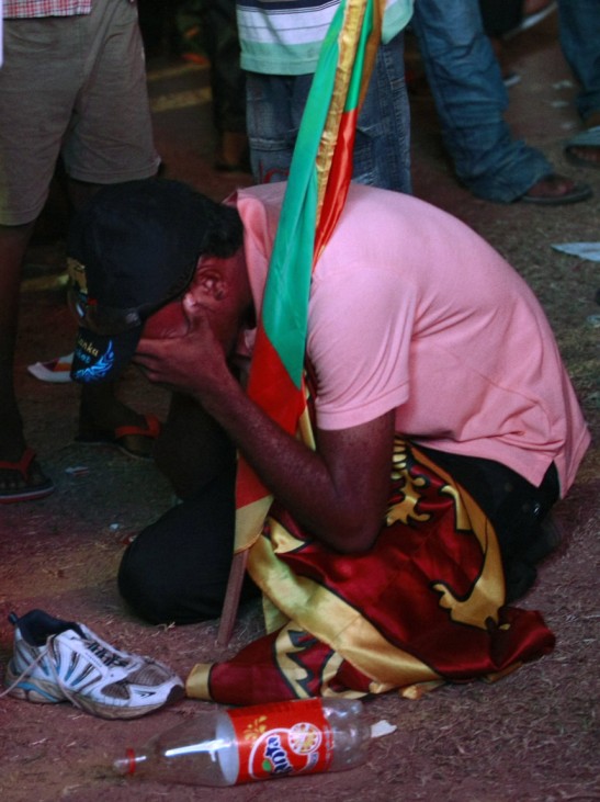 A Sri Lanka cricket fan cries in Colombo