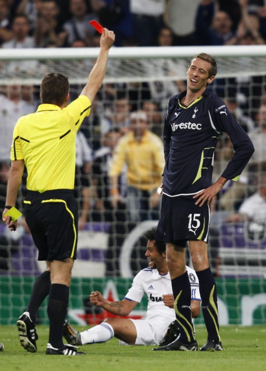 Tottenham Hotspur's Crouch receives a red card during the first leg of their Champions League quarter-final soccer match against Real Madrid in Madrid
