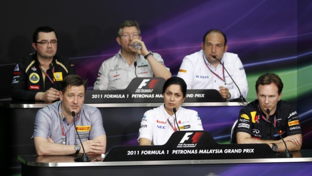 Renault's Boullier, Mercedes's Brawn, HRT's Kolles, Pirelli's Hembery, Sauber's Kaltenborn and Red Bull's Horner address a news conference during the Malaysian F1 Grand Prix at Sepang circuit outside Kuala Lumpur