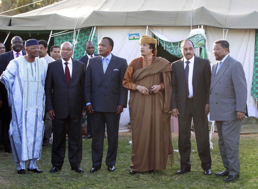 Presidents Toure of Mali, Zuma of South Africa, Nguessou of Congo, Libyan leader Gaddafi, Abdel Aziz of Mauritania and African Union Secretary-General Ping stand outside tent at Gaddafi's Bab al-Aziziya residence in Tripoli