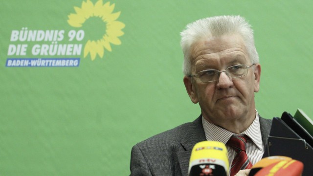 Kretschmann state leader of the Green Party in Baden-Wuerttemberg attends a news conference in Stuttgart