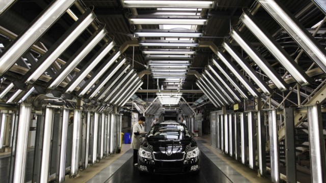 A worker makes a final inspection of the Skoda Octavia car in the Skoda Auto Car factory in Mlada Boleslav