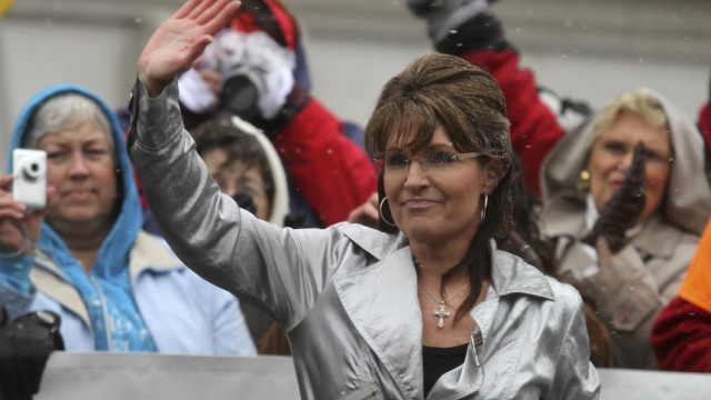 Sarah Palin delivers a speech to a Tax Day rally at the State Capitol in Madison, Wisconsin