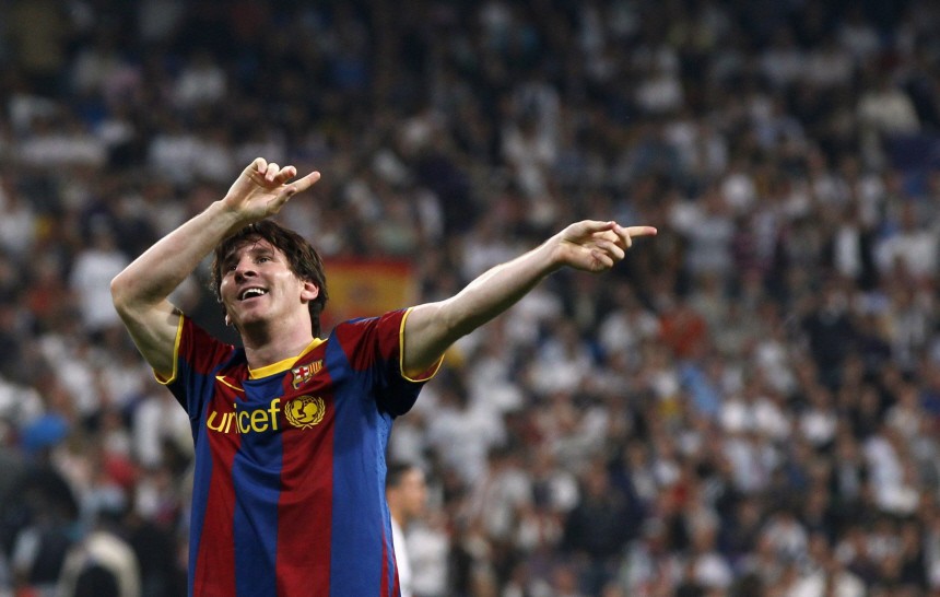 Barcelona's Lionel Messi celebrates his second goal against Real Madrid during their Champions League semi-final first leg soccer match at Santiago Bernabeu stadium