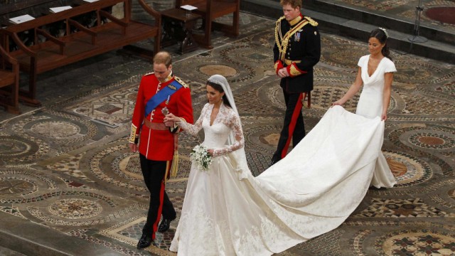 Britain's Prince William and Catherine, Duchess of Cambridge, walk up the aisle after their wedding ceremony in Westminster Abbey, in central London