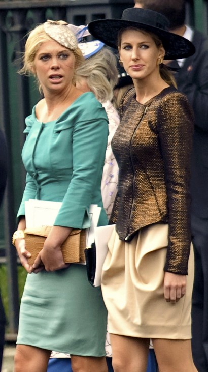 Chelsy Davy (L), leaves Westminster Abbey after the wedding of Britain's Prince William and his wife Catherine, Duchess of Cambridge, in central London