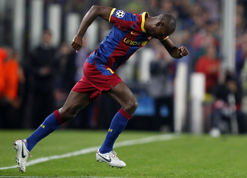 Barcelona's Abidal enters the pitch during the Champions League semi-final second leg soccer match against Real Madrid in Barcelona