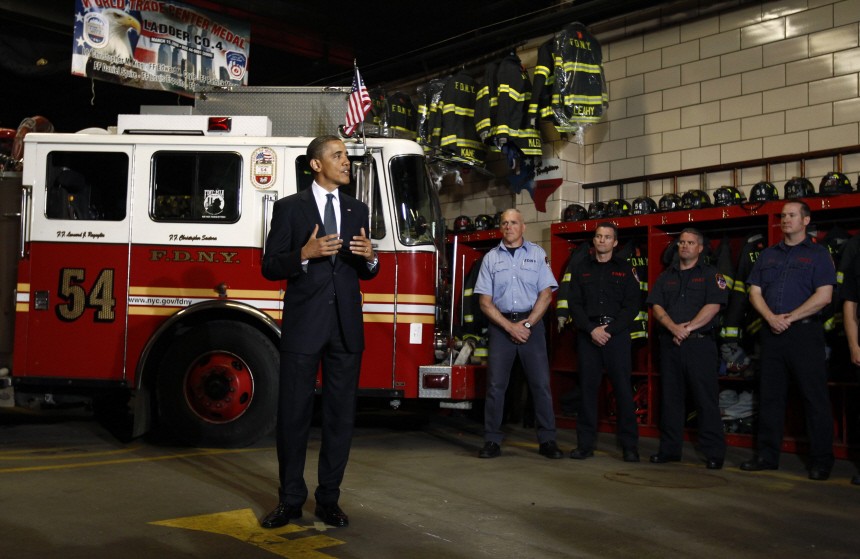 U.S. President Barack Obama talks with firefighters at the Engine 54 Ladder 4 New York Fire Department firehouse in New York's Times Square