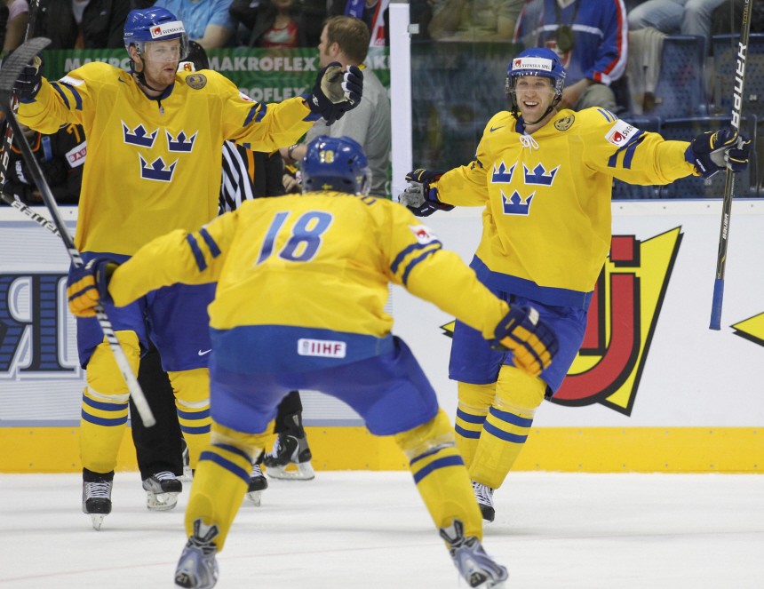 Sweden's players celebrate a goal against Germany during their quarter-final match at the Ice Hockey World Championships in Bratislava
