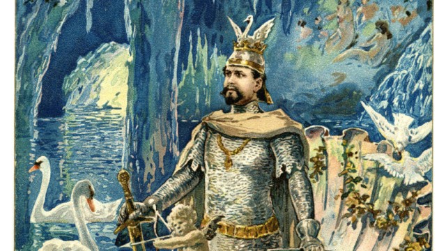 Landesausstellung König Ludwig II.: Um 1900 dürfte diese Kultpostkarte gedruckt worden sein. Sie zeigt Ludwig II. als Schwanenritter in der Venus-Grotte von Linderhof, die mit neuen chemischen Farben ausgemalt und elektrisch beleuchtet worden ist.