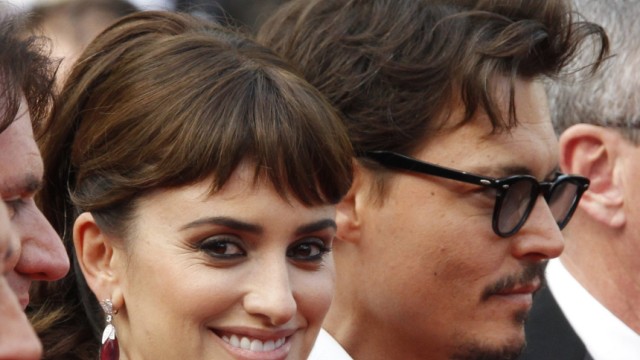Cast members Cruz and Depp pose at the 64th Cannes Film Festival