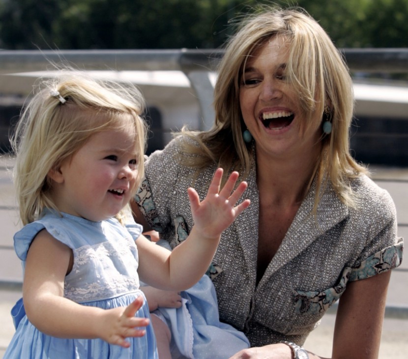 Argentine-born Princess Maxima of the Netherlands laughs next to her daughter Catharina-Amalia