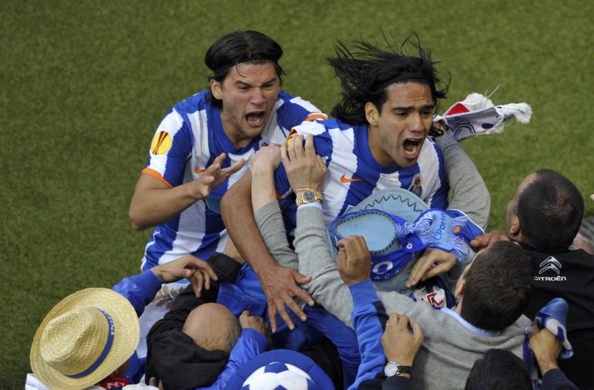 Porto's Falcao and Sapunaru celebrate a goal against Braga during their Europa League final soccer match in Dublin