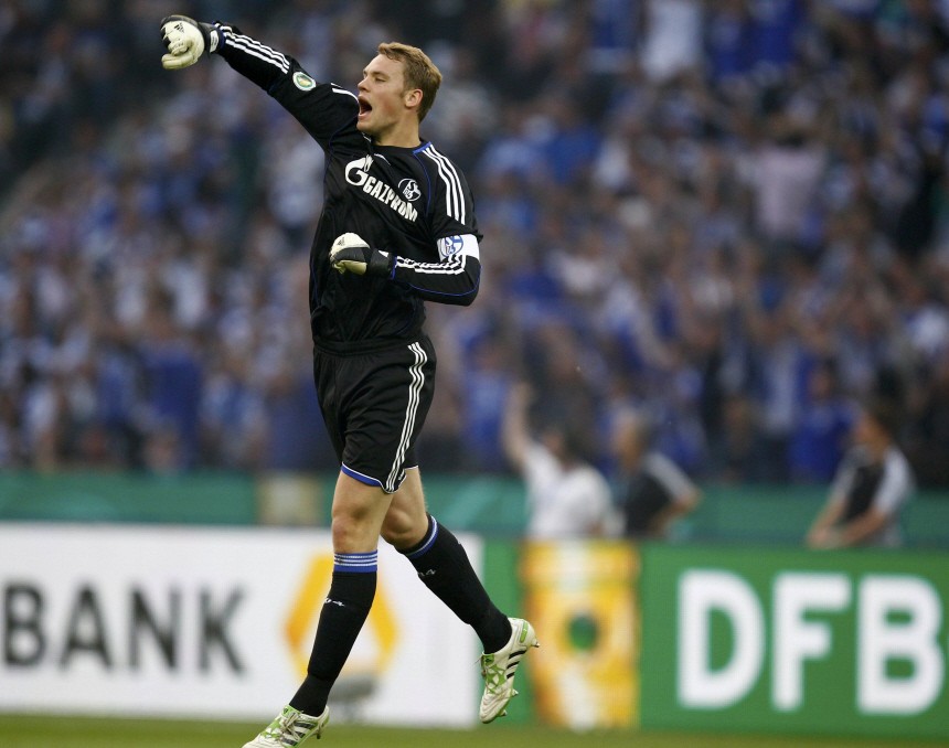 Schalke 04's goalkeeper Neuer celebrates a goal against MSV Duisburg during the German DFB Cup (DFB Pokal) final soccer match in Berlin