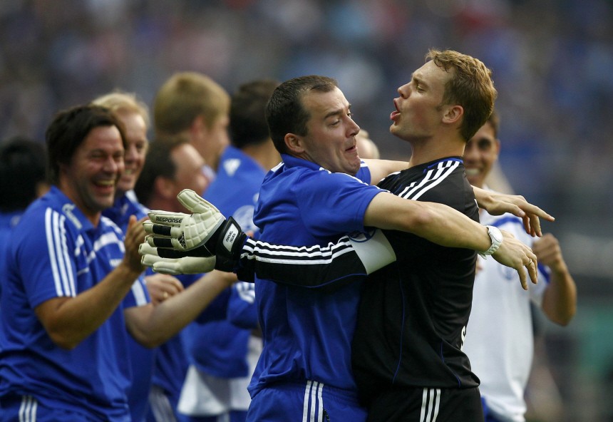 Schalke 04's goalkeeper Neuer celebrates with team mates a goal against MSV Duisburg during the German DFB Cup (DFB Pokal) final soccer match in Berlin