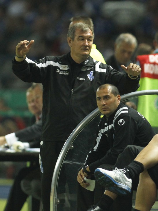 MSV Duisburg's coach Sasic reacts during the German Cup final soccer match against Schalke 04 in Berlin
