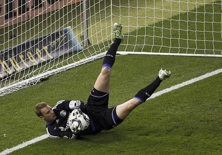 Schalke 04's goalkeeper Neuer makes a save during the German Cup (DFB Pokal) final soccer match against MSV Duisburg in Berlin