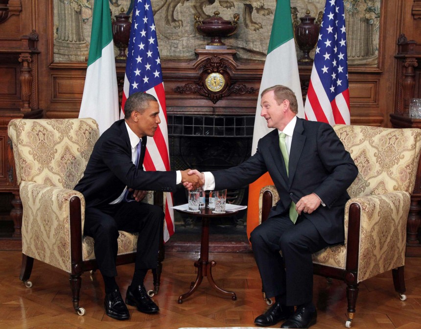 U.S. President Barack Obama poses with Ireland's Prime Minister Enda Kenny during their meeting in Farmleigh near Dublin