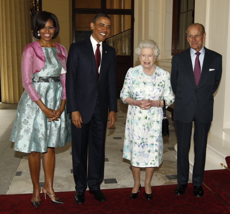 U.S. President Obama and first lady pose with Queen Elizabeth II and the Prince Philip at Buckingham Palace in London