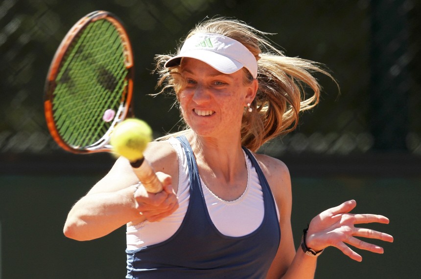 Barthel of Germany returns the ball to Pavlyuchenkova of Russia during the French Open tennis tournament at the Roland Garros stadium in Paris
