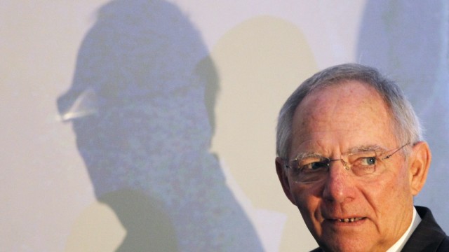 German Finance Minister Schaeuble arrives to attend the Brussels Economic Forum