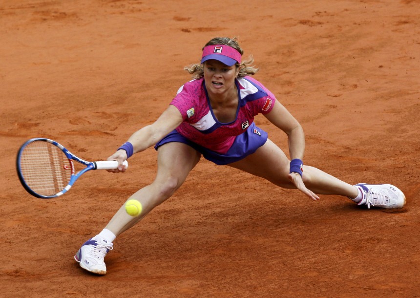 Clijsters of Belgium returns the ball to Rus of the Netherlands during the French Open tennis tournament at the Roland Garros stadium in Paris